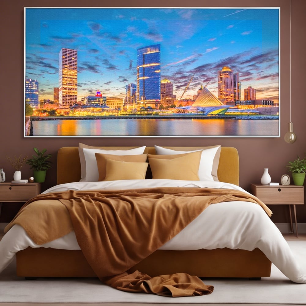 Tablou canvas cu panorami urbana nocturna milwaukee pe apa, in rama de aluminiu argintiu, pe perete intr-un dormitor